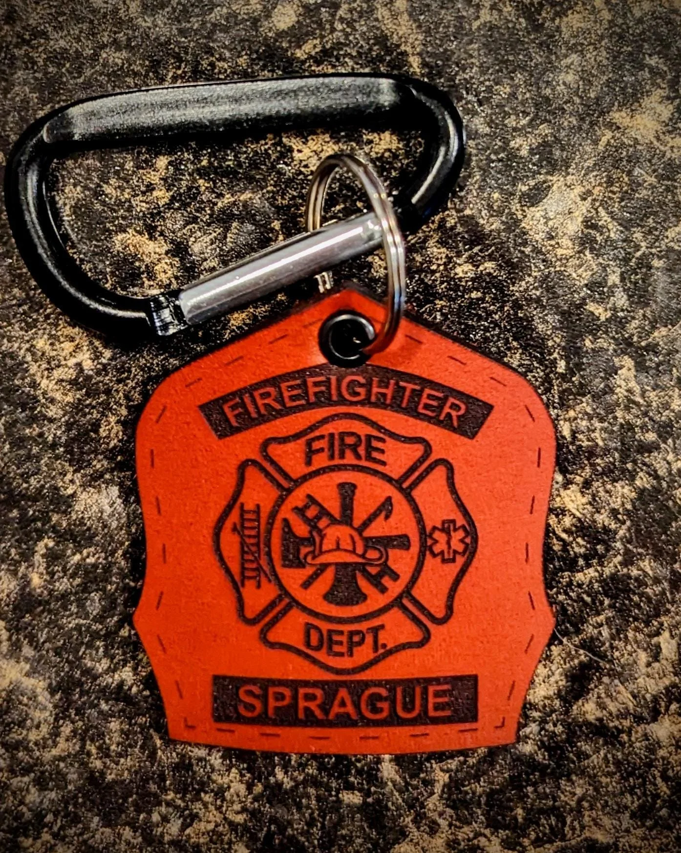 Customizable leather firefighter helmet shield keychain with engraved details